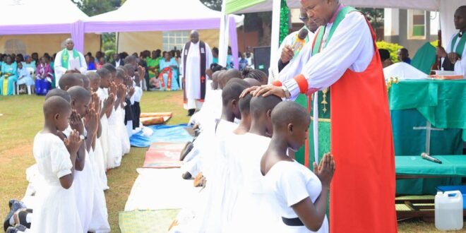 Bishop Kagodo Confirms 60 Christians at Buziika, Urges Parents to Prioritize Education and Unity