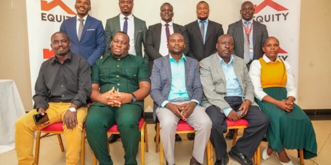 06 In the photo is Equity Bank officials and some of the school owners that attended the event.