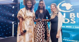Winfred Warui, Senior Manager, International Banking and Cross-Border Payments at Equity Bank Uganda upon receiving the Corporate Business of the Year award on behailf of the bank (2)