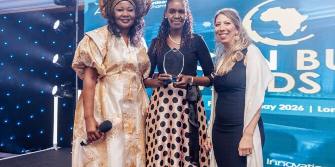 Winfred Warui, Senior Manager, International Banking and Cross-Border Payments at Equity Bank Uganda upon receiving the Corporate Business of the Year award on behailf of the bank (2)