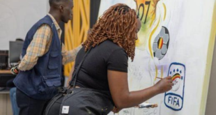 An artist gives an impression of the Uganda Cranes jersey theme