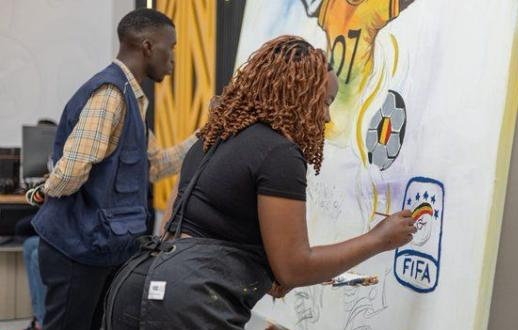 An artist gives an impression of the Uganda Cranes jersey theme