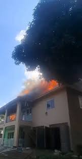 SHEEMA POLICE RESCUE WOMAN IN HOUSE FIRE - MK Newslink