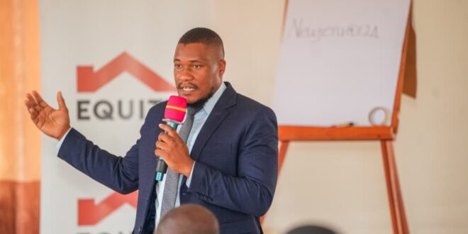 Brian Ddamba SME Business Development Manager, addressing School owners during a School Bridge Financing seminar