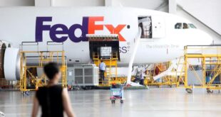 A FedEx Express plane is seen at a maintenance base of Guangzhou Aircraft Maintenance Engineering Company Limited (GAMECO) at the airport in Guangzhou.