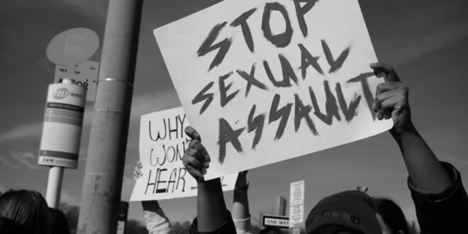 A poster calling for an end to sexual assault during a protest.