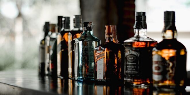 Alcoholic beverages on a bar table.