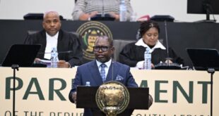 Minister Enoch Godongwana delivers the budget speech in Parliament.