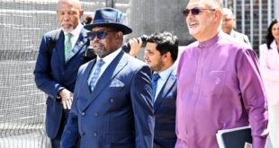 SARS Commissioner Edward Kieswetter and Finance Minister Enoch Godongwana walk to the Parliament Dome for the tabling of the Budget 2026 on February 25, 2026