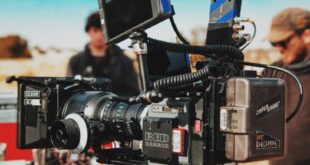 Cast members seen at a movie set.