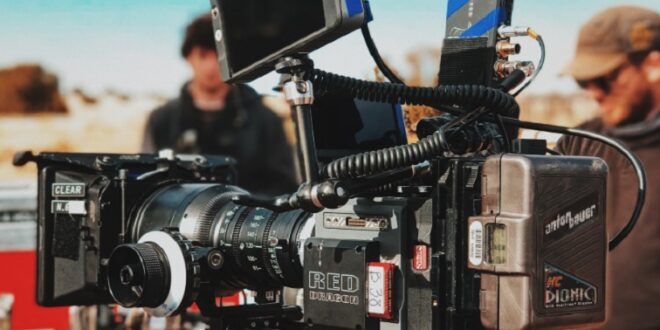 Cast members seen at a movie set.