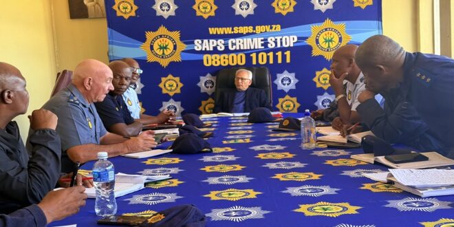 Acting Police Minister Firoz Cachalia is being briefed on the shooting in Westbury, Johannesburg, March 7, 2026.