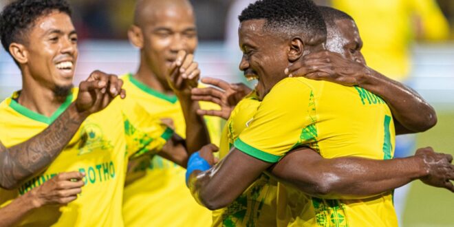 Mamelodi Sundowns players celebrate a goal during a match.