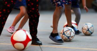 Far from home migrant children kick off own World Cup