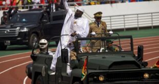 Guinea's President-elect Mamady Doumbouya arrives in a vehicle to take the oath of office during a swearing-in ceremony in Conakry, Guinea, January 17, 2026.