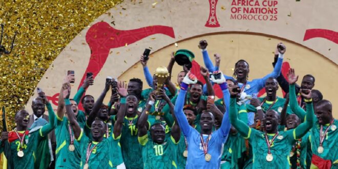 CAF Africa Cup of Nations - Morocco 2025 - Final - Senegal v Morocco - Prince Moulay Abdellah Stadium, Rabat, Morocco - January 18, 2026 Senegal's Sadio Mane lifts the trophy with teammates as they celebrate after winning the Africa Cup of Nations.
