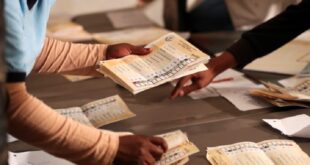 Election officials count ballots after the closing of the local government elections, at a farm in Alewynspoort, outside Johannesburg, South Africa November 1, 2021.