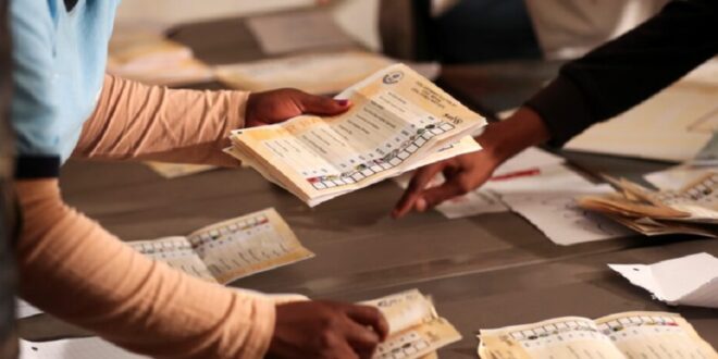 Election officials count ballots after the closing of the local government elections, at a farm in Alewynspoort, outside Johannesburg, South Africa November 1, 2021.