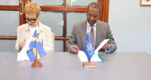 Ambassador of Sweden to South Africa Anna Karin Eneström and IOM’s Chief of Mission in South Africa Yitna Getachew sign agreement in Pretoria on March 19, 2026.
