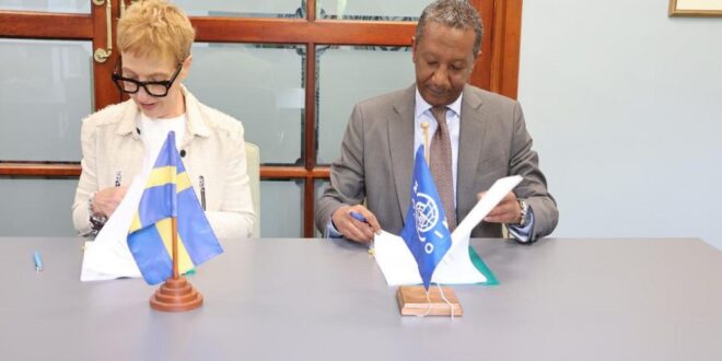 Ambassador of Sweden to South Africa Anna Karin Eneström and IOM’s Chief of Mission in South Africa Yitna Getachew sign agreement in Pretoria on March 19, 2026.