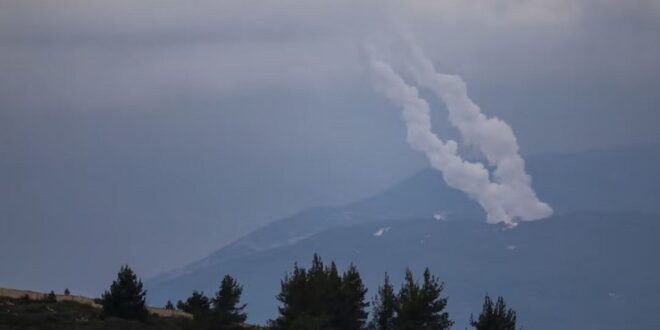 Smoke rises as projectiles are fired from Lebanon towards Israel, following an escalation between Hezbollah and Israel amid the US-Israeli conflict with Iran, as seen from the Israel-Lebanon border in northern Israel on March 4, 2026.