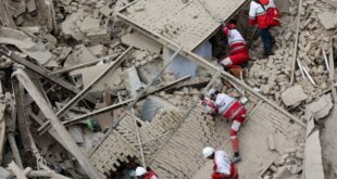 Emergency personnel work at the site of a strike on a residential building, amid the US-Israeli conflict with Iran, in Tehran, Iran on March 16, 2026.