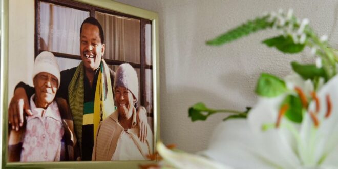 A historical picture Congress of the People (COPE) leader Lekota Mosiuoa (Centre) with two unnamed women at the family home in Bloemfontein.
