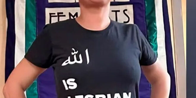 Ibtissam (Betty) Lachgar wore her "Allah is lesbian shirt in in a 2022 Facebook post as an act of solidarity with two LGBTQ activists in Iran who were sentenced to death after being accused of promoting homosexuality, promoting Christianity, and communicating with media hostile to the Islamic Republic. (Photo courtesy of Ibtissam Lachgar)