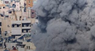Smoke rises after an Israeli strike on Beirut's southern suburbs, March 4, 2026.