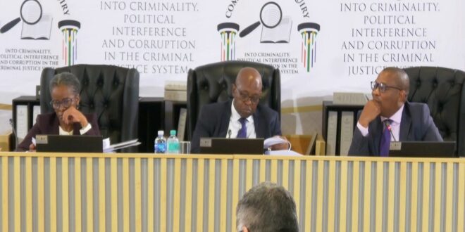 Madlanga Commission of Inquiry Chairperson Justice Mbuyiseli Madlanga with commissioners Adv Sesi Baloyi and Adv Sandile Khumalo during a hearing in Pretoria on March 20, 2026.