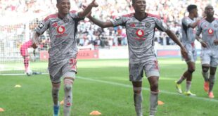 Orlando Pirates players Relebohile Mofokeng and Tshepang Moremi celebrate after winning 6-0 against TS Galaxy.