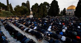 Muslims attend Eid al-Fitr prayers which mark the end of Ramadan, in Al-Aqsa compound, also known to Jews as Temple Mount, amid the ongoing conflict in Gaza between Israel and Palestinian Islamist group Hamas, in Jerusalem's Old City