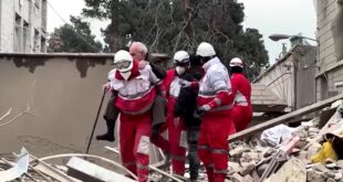 Search and rescue under way in Tehran after building destroyed