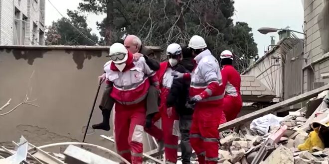 Search and rescue under way in Tehran after building destroyed