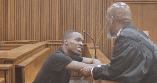 Accused number two in the former Bafana Bafana Captain Senzo Meyiwa murder trial Bongani Ntanzi speaks to his lawyer.