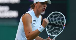 Poland's Iga Swiatek reacts during her round of 16 match against Denmark's Clara Tauson during Wimbledon at All England Lawn Tennis and Croquet Club in London, Britain on July 7, 2025.