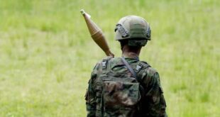 A Rwanda Defence Force (RDF) soldier stands in position at the Grande Barrier border amid clashes between M23 the Armed Forces of the Democratic Republic of the Congo (FARDC), at the border crossing point at Gisenyi, in Rubavu district, Rwanda on January 29, 2025.