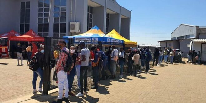 Students line up outside a Technical and Vocational Education and Training (TVET).